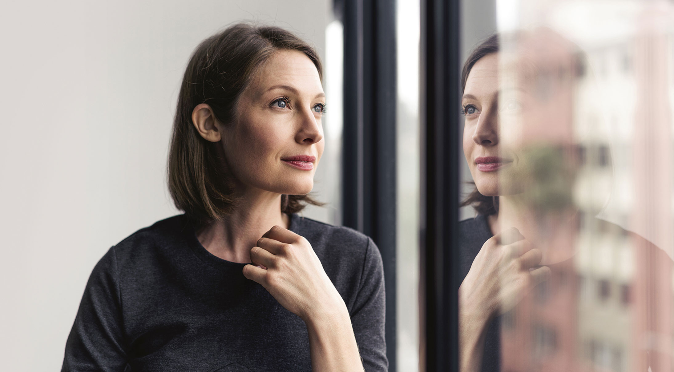 Woman looking at the windows